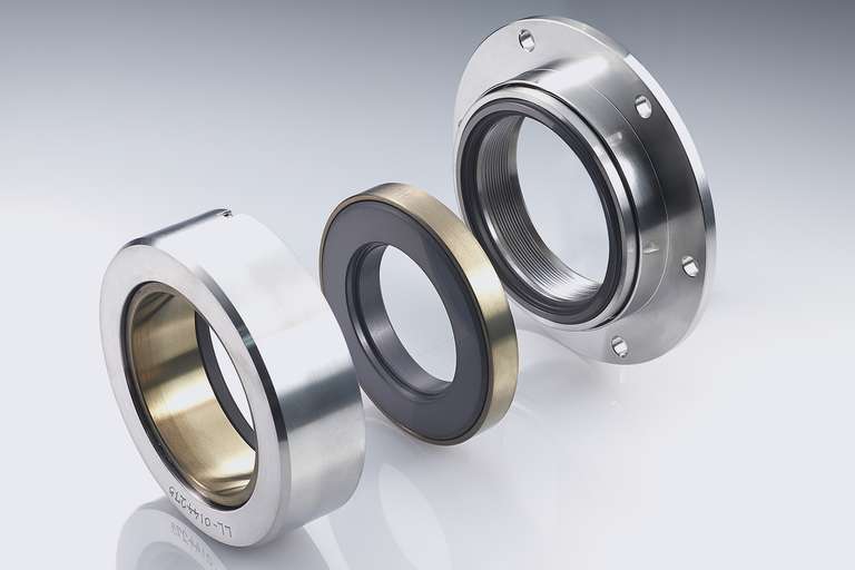 Shaft seals for screw compressors